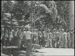 1943: BOUGAINVILLE CAMPAIGN: VS U.S. Marines on line, male playing bugle, soldiers on food line getting food, eating regular meal, chewing on chicken drumstick. WWII, World War II, Pacific Front, mess hall Instructional Video
