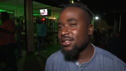 Zimbaweans watch Mugabe's national address in pub, express dismay Instructional Video