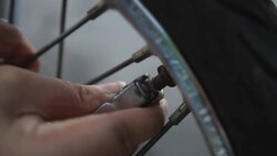 inflating motorcycle tire Stock Footage