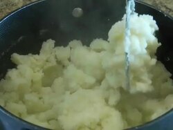 Mashing potatoes Stock Footage
