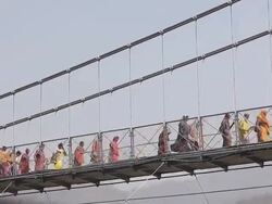 Time lapse on Lakshman Jhula bridge in Rishikesh Stock Footage
