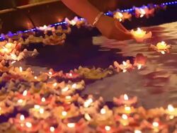 Candles in water Stock Footage