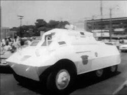 B/W 1963 PAN tank on street to quash civil rights demonstration / Alabama / newsreel Stock Footage
