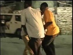 WARNING GRAPHIC VIDEO: Haitians piled bodies along the devastated streets of their capital Wednesday after a powerful earthquake crushed thousands of structures, from schools and shacks to the National Palace and the U.N. peacekeeping headquarters. News Clip
