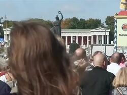 MS crowd walking infront of statue of "Bavaria" ,street on Oktoberfest / Munich, Bavaria, Germany Stock Footage