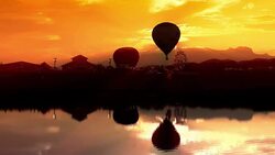 Hot Air Balloon Silhouette with water reflection Stock Footage