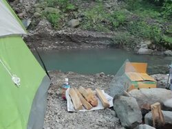 MS PAN Shot of friends make fire at camping / Okutama, Tokyo, Japan Stock Footage