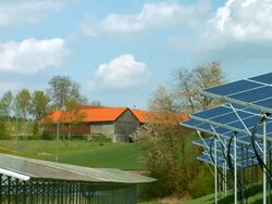 Solar Power Station on Farmland TL (4K/UHD to HD) Stock Footage