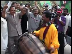 Celebrations as Sharif returns, reinstated judge salutes crowds News Clip