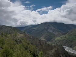 T/L with camera move, cloud over Manang Spiky Rocks, Himalayas Stock Footage