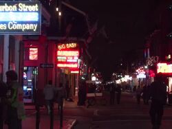 Bourbon Street nightlife foot traffic by Bourbon Street Blues in New Orleans Stock Footage