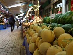 Melon stall on street market Stock Footage