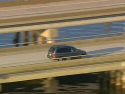 MS AERIAL ZI ZO TS Shot of Traffic moving on Wright Memorial bridge / North Carolina, United States Stock Footage