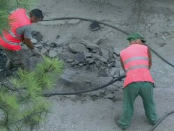 Road Workers with Jackhammer Stock Footage