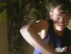 CU PAN ZI TD Afghan soldier getting dressed / Musa Qala, Helmand Province, Afghanistan. Stock Footage