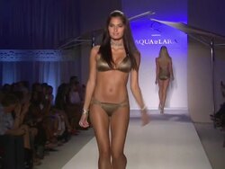 Models walk the runway during the Aqua Di Lara Swimwear 2011 fashion show at the Aqua Di Lara/Qiss Qiss - Runway - MBFW Miami Swim 2011 Stock Footage