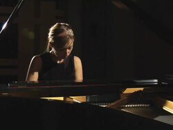 HD: Woman plays the piano Stock Footage