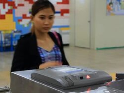 Woman Validating The Ticket Stock Footage