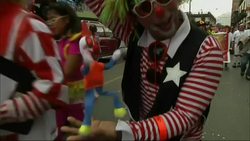 Hundreds of professional clowns dressed in colorful costumes, wigs and face paint marched through the streets of central Lima on Sunday to celebrate Peruvian Clown Day. (May 25) Instructional Video