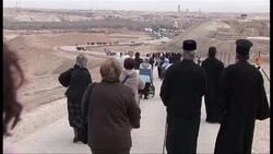 CLEAN: Christians flock to river Jordan News Clip