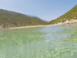 SLO MO Triumphant Man In The Sea Stock Footage