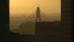 A flag tops a bridge tower of ANZAC Bridge in Sydney, Australia. Stock Footage