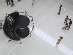 MS T/L HA Shot of people walking and watching by piano player and band at mall / Hong Kong, China Stock Footage