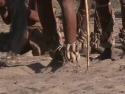 Ju hoansi San Bushmen of Nyae Nyae: dancing feet, Namibia Stock Footage