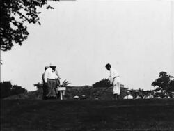B/W 1927 Bobby Jones teeing off at National Amateur Golf Championship / instructional Stock Footage