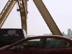 WS POV View of buildings, river and traffic moving on Queensborough Bridge / New York, United States Stock Footage