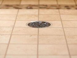 Residential Tiled Shower Drain with Running Water which Stops Stock Footage