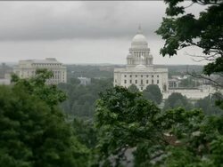 Rhode state capitol (state house) through the trees as seen from Prospect Park on a cloudy day. Stock Footage