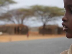 Young boy has his water bottled filled Stock Footage