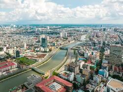 WS T/L View of Ho Chi Minh City downtown with passing clouds / Ho Chi Minh City, Southeastern, Vietnam Stock Footage