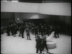 B/W 1959 high angle people near door in lobby of Guggenheim Museum / NYC / newsreel Stock Footage