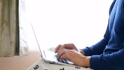 Youngman work at bed at morning Stock Footage