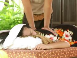 Woman Relaxing While Getting oil back Massage Stock Footage