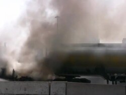 Firefighters, fire trucks on emergency site. Rescue mission, highway accident. Stock Footage