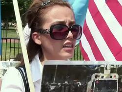 2009 MS ZO PAN Protestors shouting slogans during an anti-China protest outside the White House in support of the Uygurs/ Washington D.C., USA/ AUDIO Stock Footage