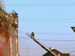 Firefighter in stairs Stock Footage
