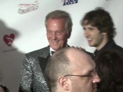 EVENT CAPSULE REPORTER/CHYRON: MusiCares 2009 Person Of The Year Tribute, Los Angeles, CA, United States 02/06/09 Stock Footage