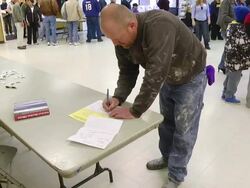 MS Shot of voter reigisters for provisional ballot in presidential election / Holland, Ohio, United States Stock Footage