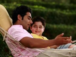 Man telling story to his son  Stock Footage