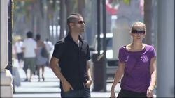 Shoppers and designer shops on Rodeo Drive News Clip