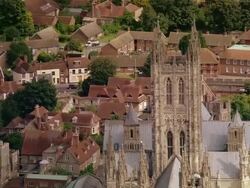 Aerial zoom out over Canterbury Cathedral and the City of Canterbury / Kent, England Stock Footage