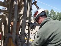 Farmers Hire Drilling Crew To Search For Water To Irrigate Crops Stock Footage