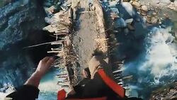 Hiker crossing the bridge Stock Footage