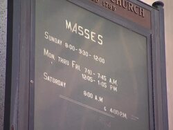 Weekly Mass Schedule in Front of Catholic Church Stock Footage