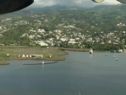 End of flight; landing on Moorea Island airport Stock Footage
