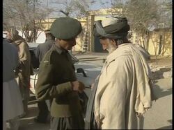 Security at border crossing + Kandahar refugees News Clip